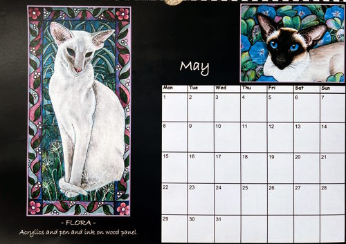 May calendar page by Suzanne Le Good, featuring lilac and seal point Siamese cats against floral backgrounds in pink, green and turquoise.