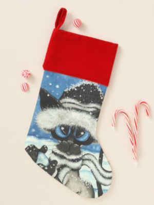 Siamese cat Christmas stocking featuring Siamese cat in snowy landscape and winter hat