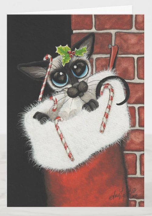 Siamese cat snuggles down into a red Christmas stocking with white fur top, decorated with candy canes and hung next to a fireplace. Artwork by AmyLyn Bihrle.