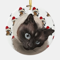 Close-up of seal point Siamese cat head on a background of Siamese cats in Santa hats - Christmas tree decoration