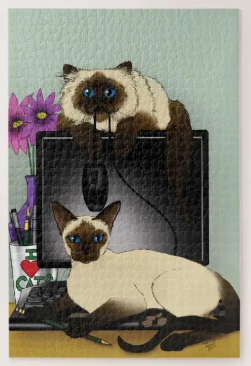 Jigsaw puzzle picture featuring Himalayan and Siamese cats sitting on the screen and keyboard of a computer. Green background.