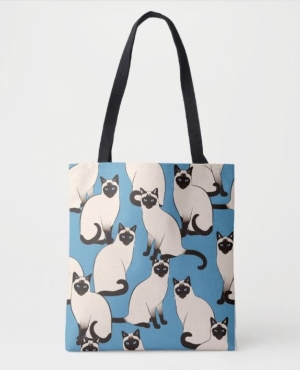 Siamese cat design on a blue tote bag with black handles
