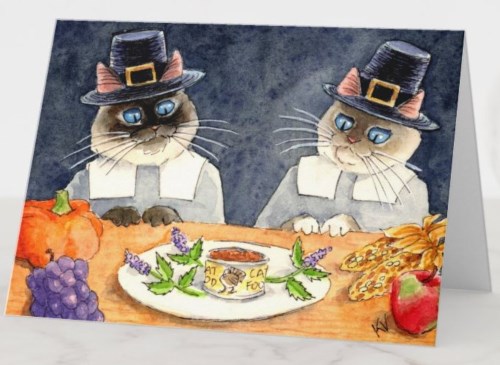 Two Siamese cats in Puritan outfits look at a Thanksgiving table bearing a plate with a tin of cat food